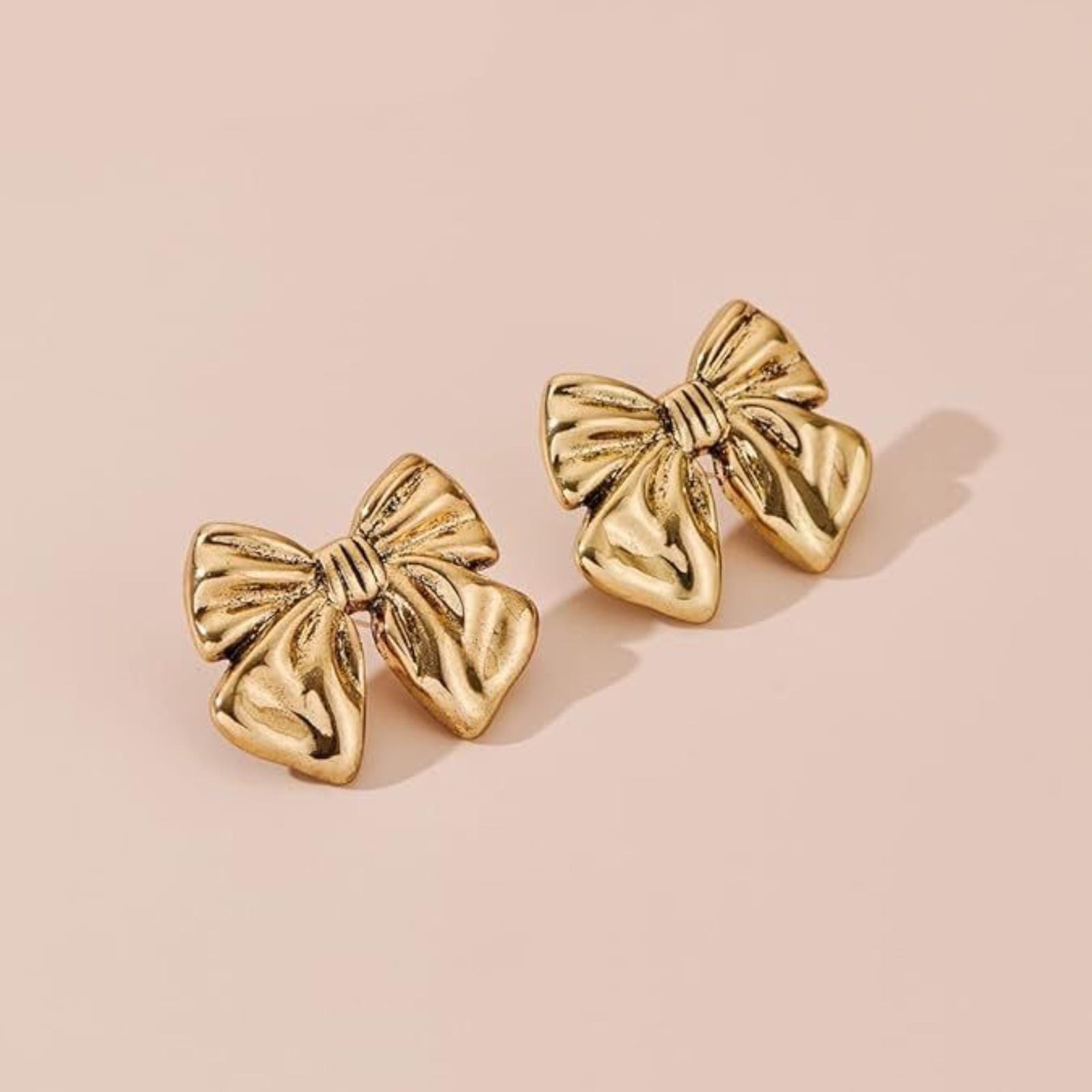 Bow model golden anti turnish earing